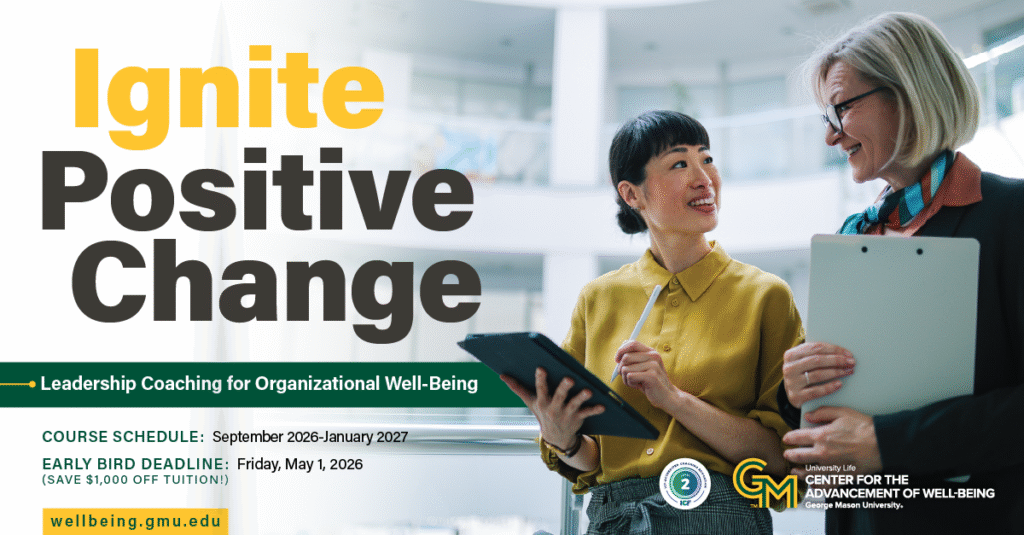 Leadership Coaching for Organizational Well-Being two women smiling in workplace